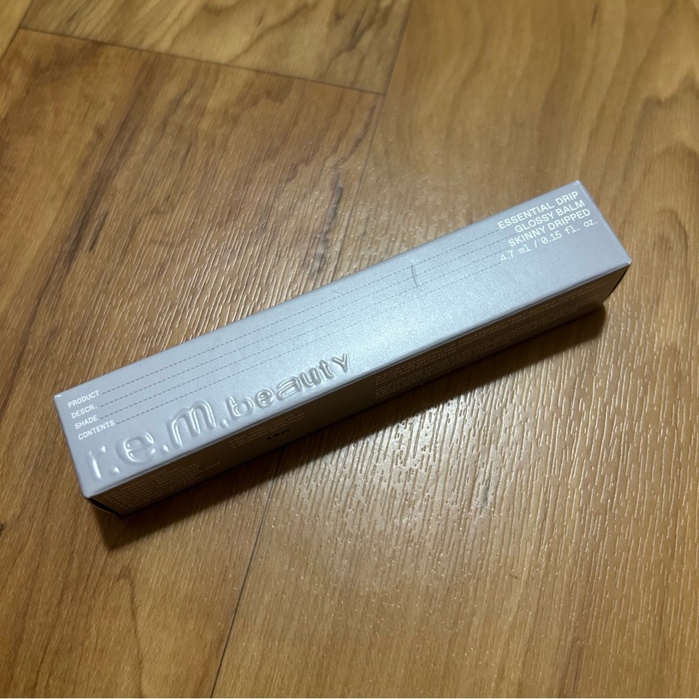 r.e.m. beauty Essential Drip Glossy Balm - Skinny Dripped